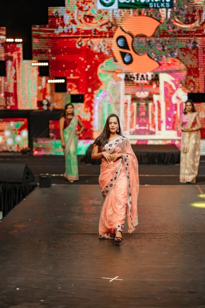 Model on the runway showing a strong fashion silhouette