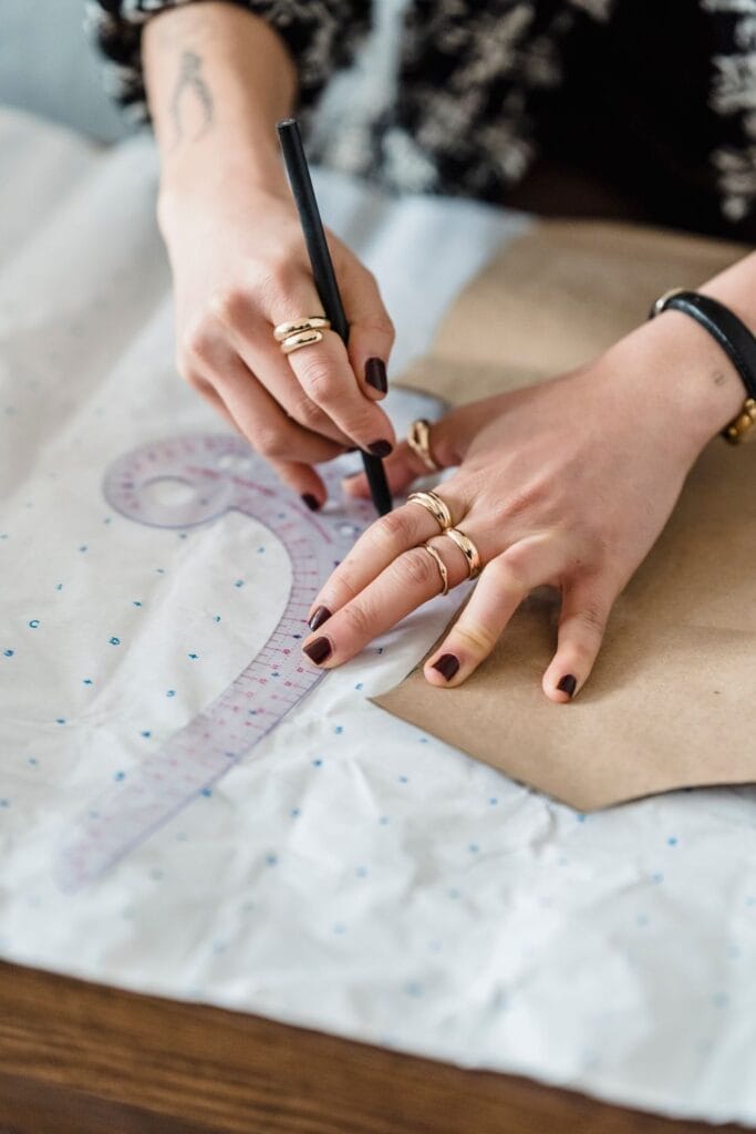 Pressing a garment in a luxury fashion atelier