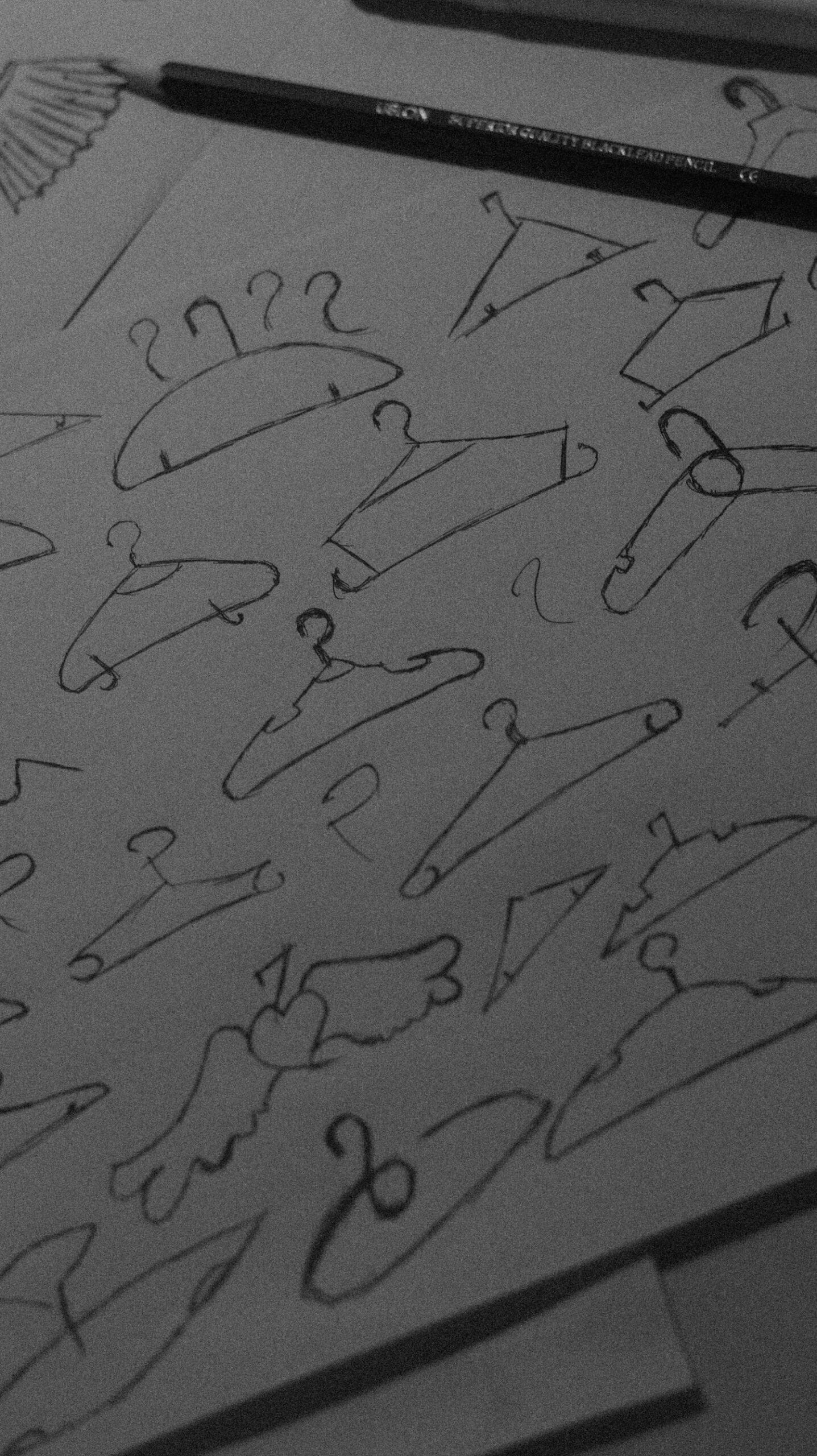 Coat hanger sketches on paper