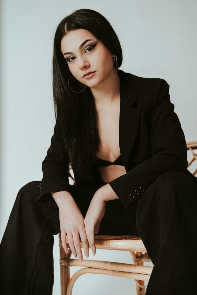 Fashion professional seated in a studio
