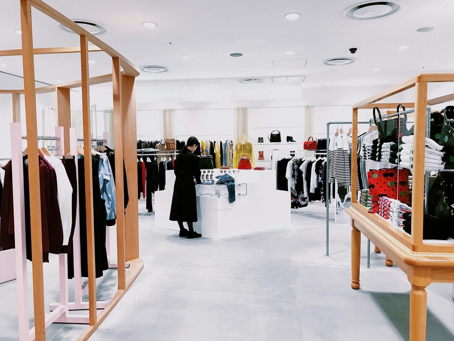 Designers looking at sketches and fabrics
