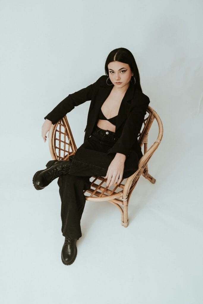 Fashion professional seated in a studio