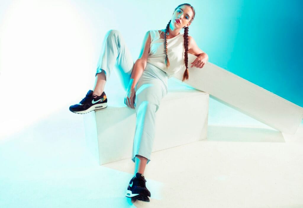 Editorial fashion model on an architectural block