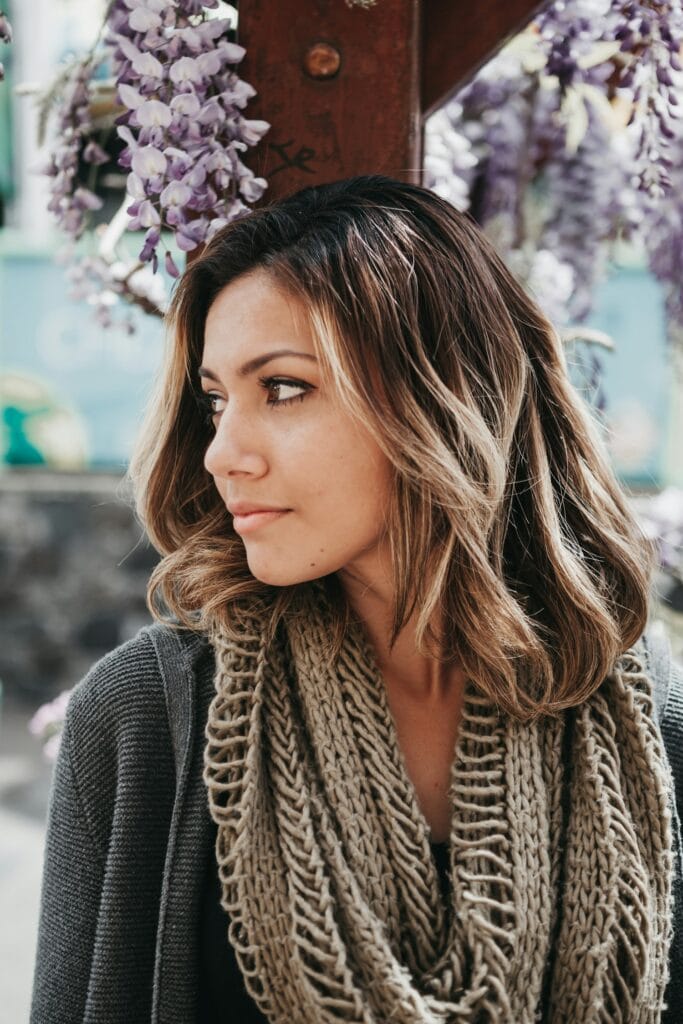 Model wearing a knitted scarf