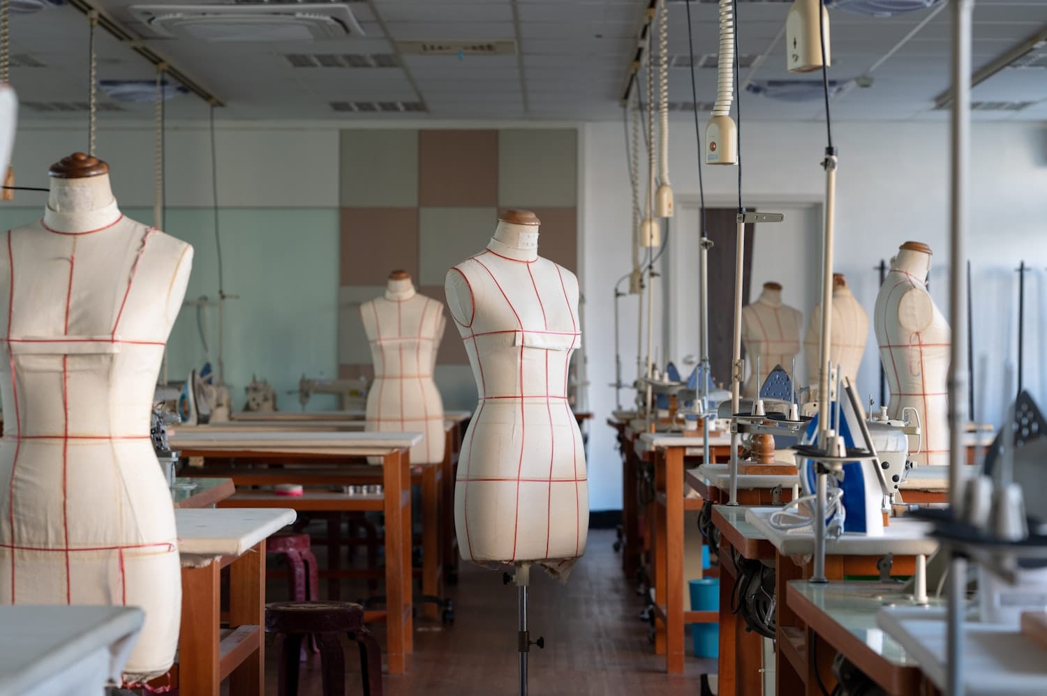 A workshop of mannequins and sewing machines