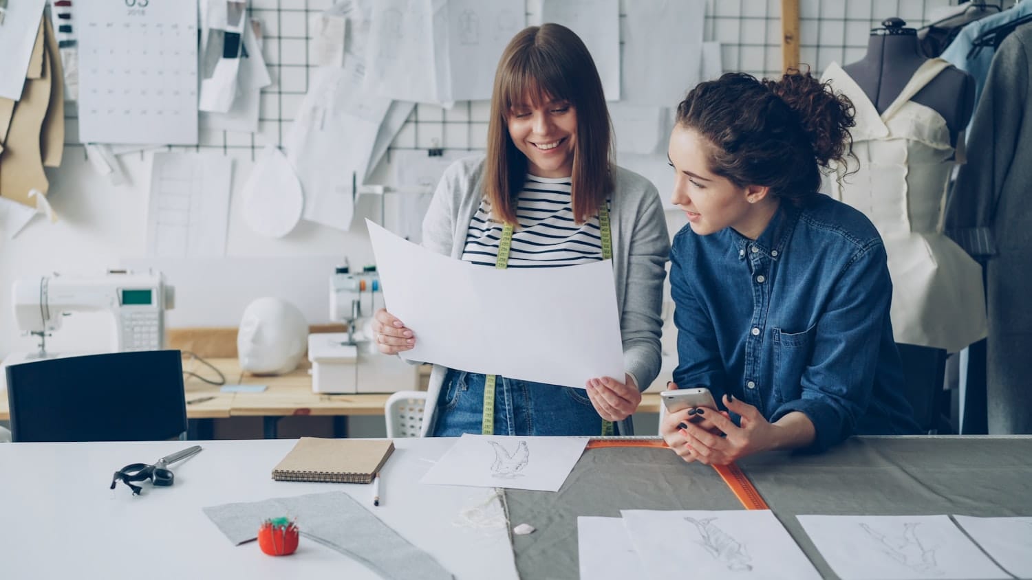 Designers reviewing a clothing pattern