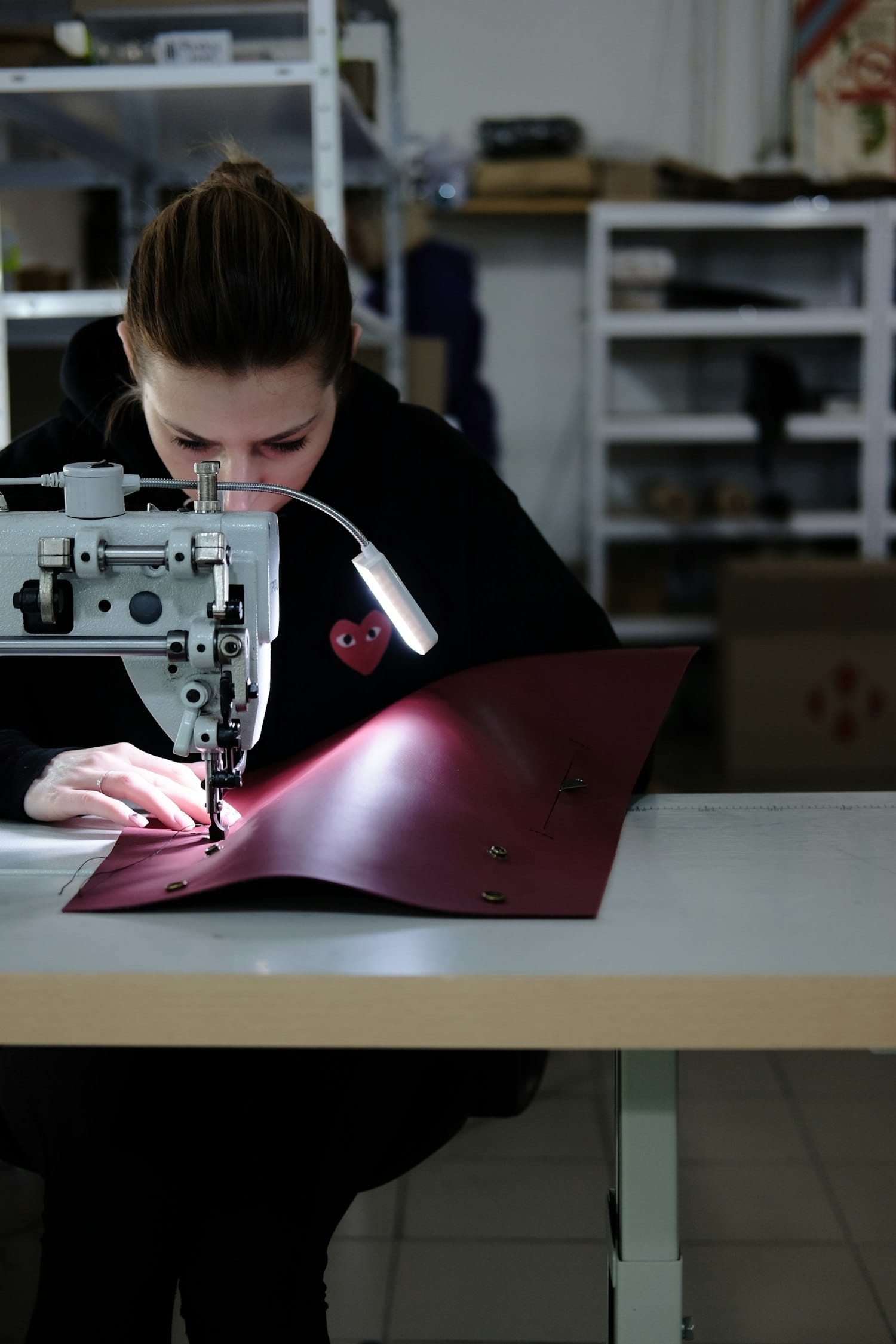 An operator at a sewing machine