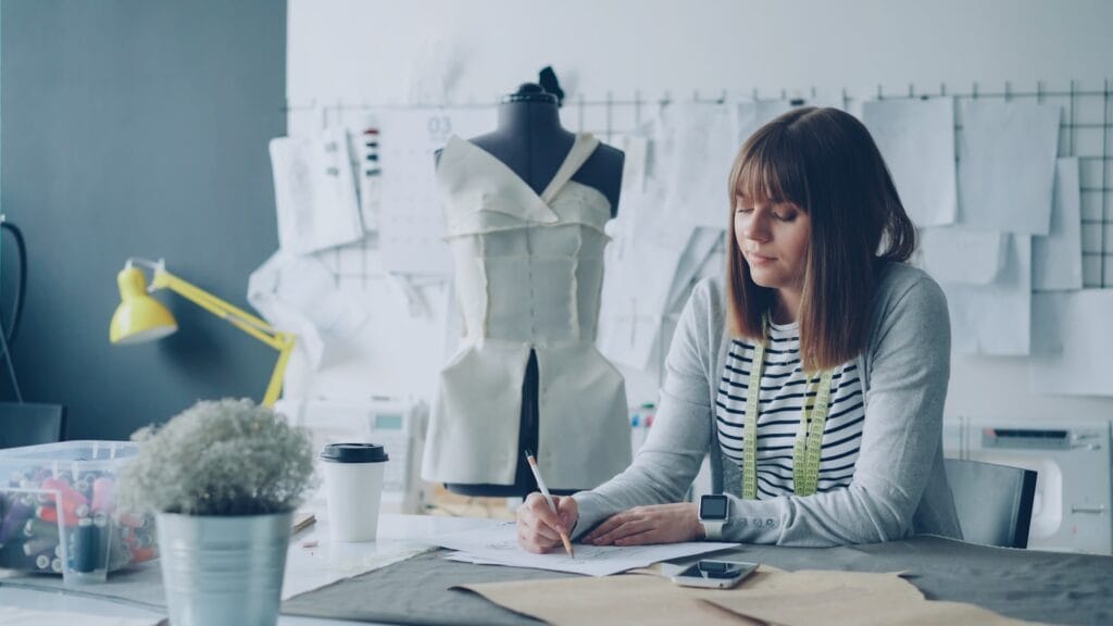 Fashion designer sketching in an atelier
