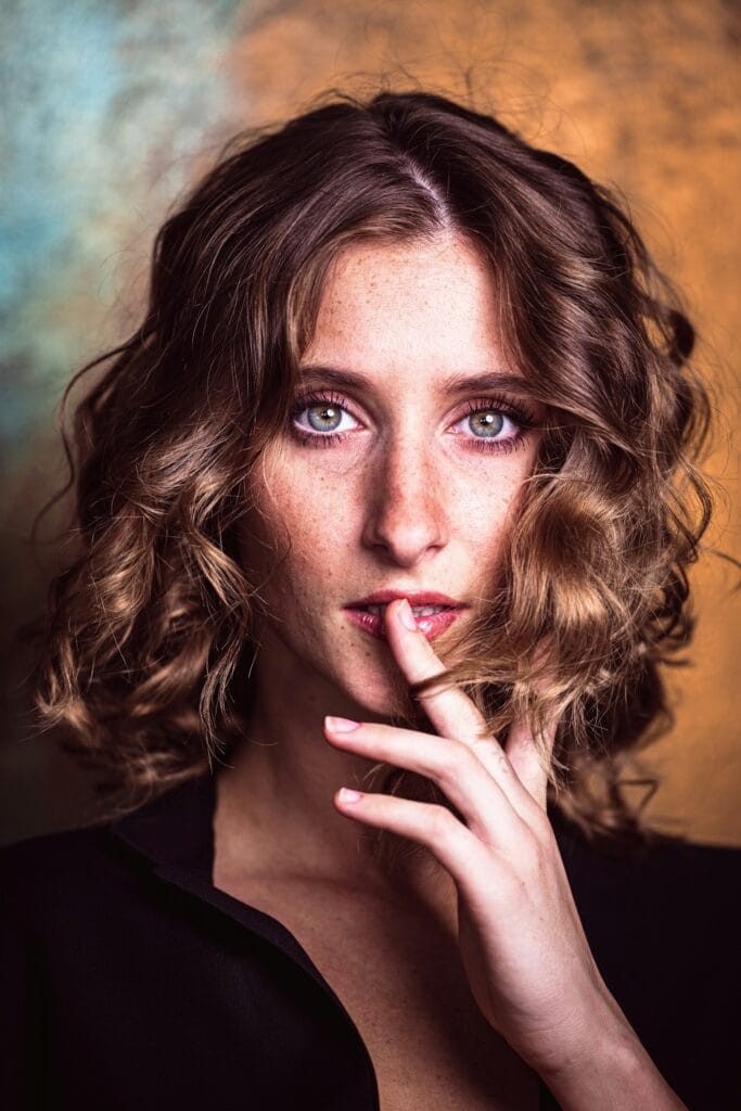 Editorial model, hand on chin