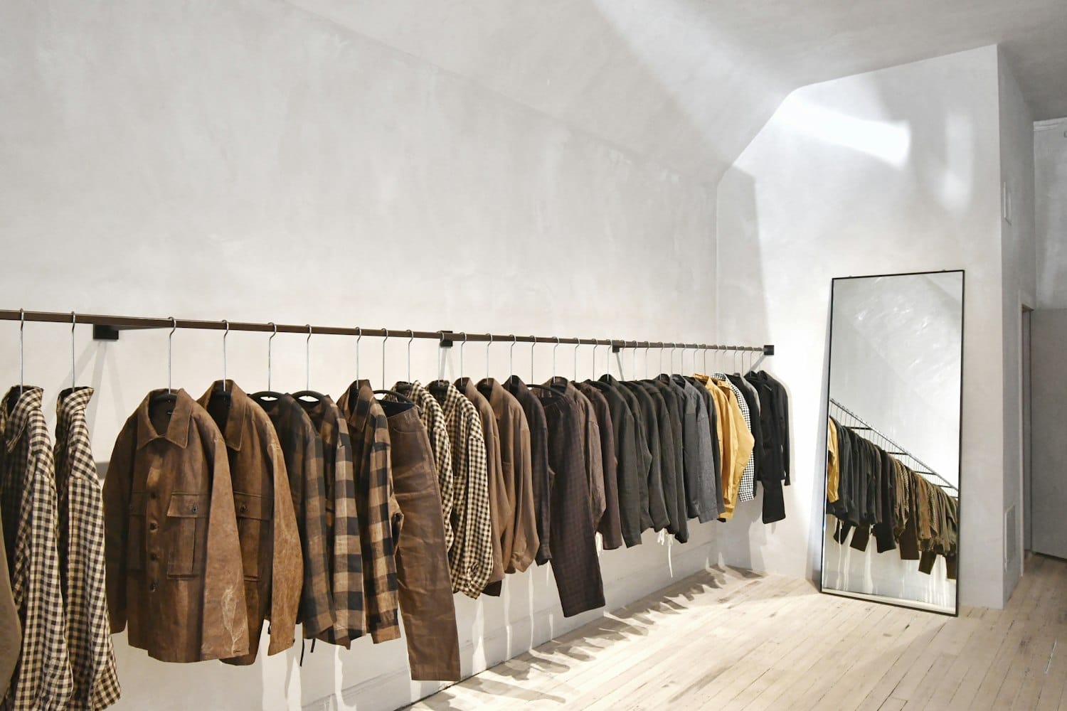 A room with garments on display