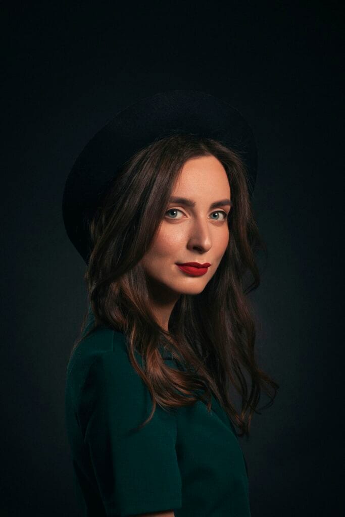 Editorial model in a hat and shirt
